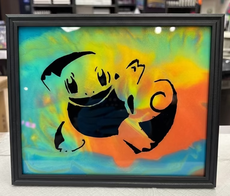 Framed colorful glass painting